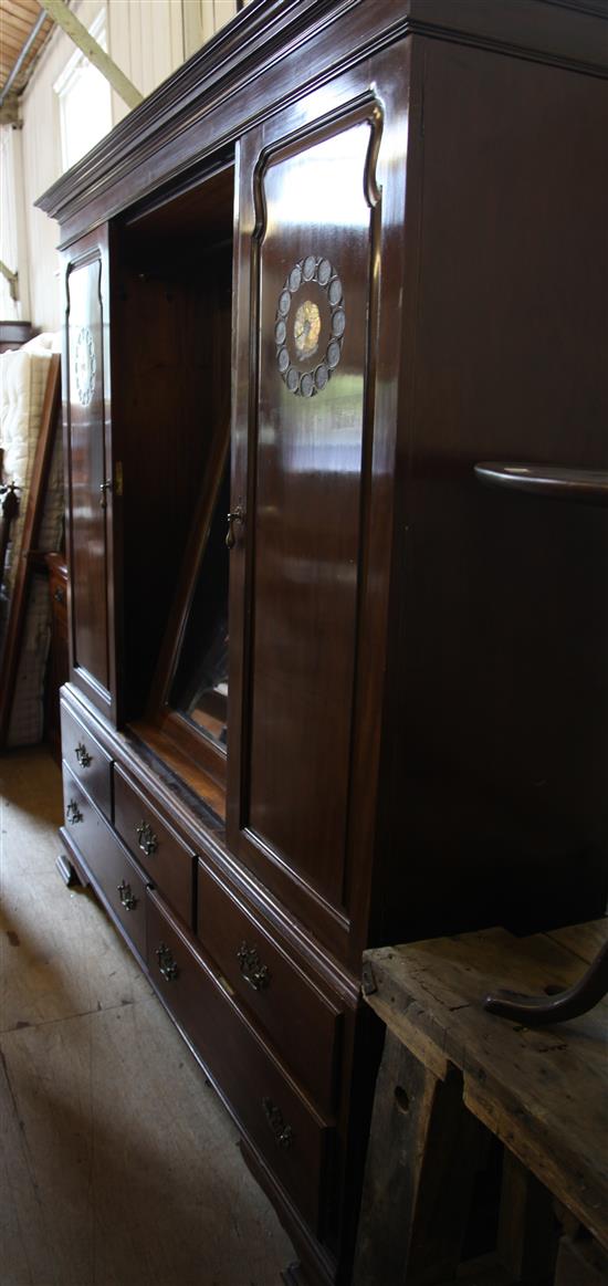 Large late Victorian mahogany and mother of pearl inlaid two door wardrobe(-)